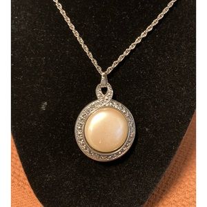 30” Two-sided necklace from vintage Avon. 30” inch quality silver-tone chain.